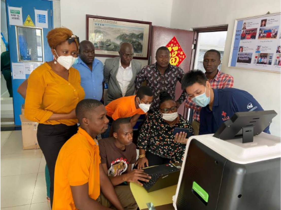 Laboratory personnel and healthcare professionals participating in diagnostic equipment training